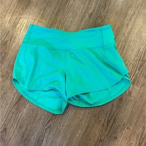 Lululemon Mid rise speed ups sz 4 Green